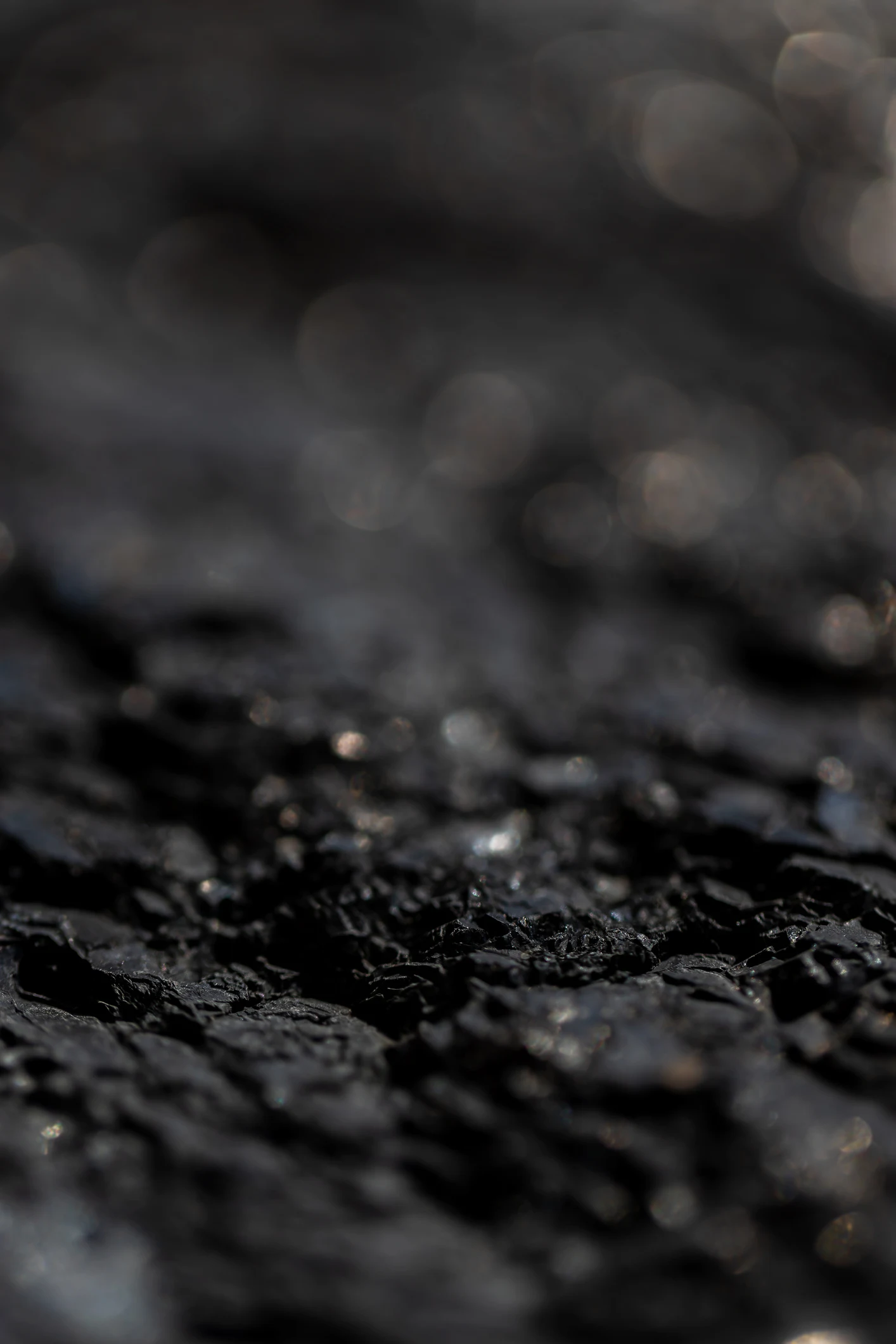 What gives bold black diamonds their captivating midnight hue?